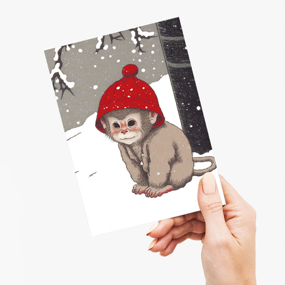 Baby monkey in the snow - Greeting Card